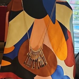 Elegant Gold Necklace with Black Accents